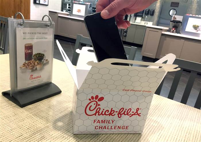 Chick-fil-A’s ‘cell phone coop,’ other eateries encourage diners to unplug